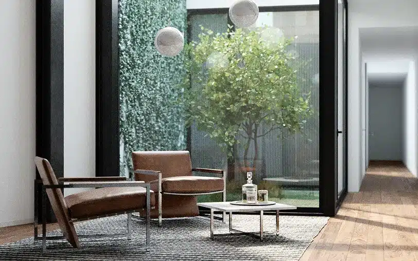 Velocity Palácio – lounge facing a planted English courtyard